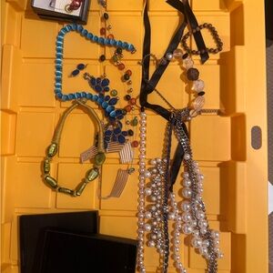 Bundle of pearl and bead necklaces